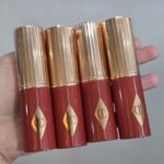 Charlotte Tilbury  Unreal Lip + Cheek Glow Blush Stick with Hyaluronic Acid Color: Cherry Glow - deep cherry red