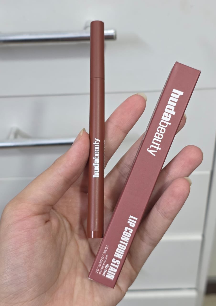 IMG-20251218-WA0147 HUDA BEAUTY Lip Contour Lip Stain for 12-Hour Wear Color: Warm Brown - burnt brown - Image 1