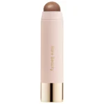 Shade Good Energy  Rare Beauty by Selena Gomez  Warm Wishes Effortless Cream Bronzer Stick Color: Good Energy - medium brown with cool undertones